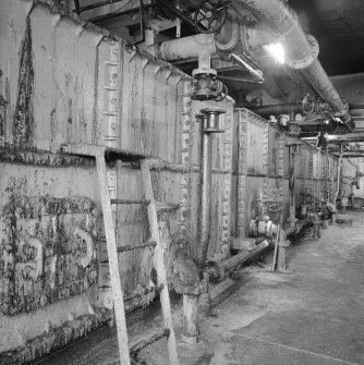 Interior view of the Recovery Process's Recovery Syrup cast-iron Storage Tanks.  The Recovery Process was designed to remove excess sugar produced from the syryp run-off from the Affination Station.  The recovered sugar was then returned to the beginning of the process (T&L No.: 21183/3)