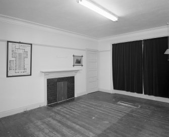 Session House, interior view from South West (with early photograph of exterior of church and plan, signed: T.G. Abercromby) on wall