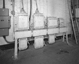 Motherwell, Craigneuk Street, Anderson Boyes
Machine Shop (Dept. 66, adjacent to Fitting Shop, built 1942): Interior detail of panel of large Anderson Boyes electrical switches at north end of west bay.  These switches are typical of the electrical products once produced by the company