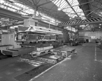 Motherwell, Craigneuk Street, Anderson Boyes
Machine Shop (Dept. 21 East End, built 1957): Interior view from east in north bay showing a Kearns Richards Horizontal Boring Machine working on the central housing of a large coal-cutting machine destined for Queensland, Australia - the last machine to be made by the company in Motherwell.