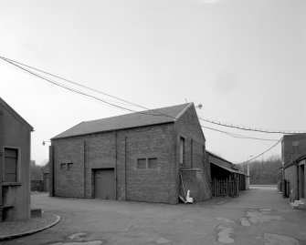Motherwell, Craigneuk Street, Anderson Boyes
Exterior view from north east of Pattern Store, with Record Store on upper floor (building erected in 1908).  The steel-framed awning was built by A & J Main of Glasgow
