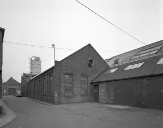Motherwell, Craigneuk Street, Anderson Boyes
Exterior view from south of Foundry (built 1920), with garages (far right)