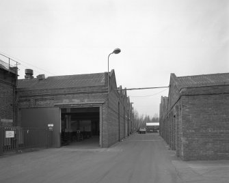 Motherwell, Craigneuk Street, Anderson Boyes
Exterior view from south showing to left the entrance to east side of large block of Machine Shops (built 1943 to 1957), and to right, range of stores (built 1955)