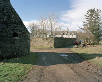 General view of farmhouse and walled garden from East.