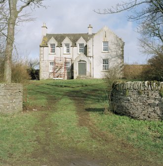 View of farmhouse from gates to South.