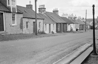 General view of north side of Victoria Street, Kirkpatrick Durham, from south west