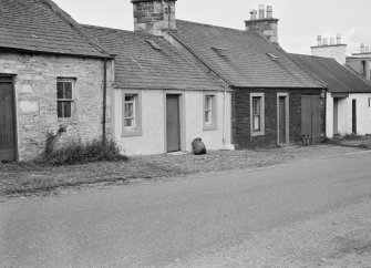 General view of north side of Victoria Street, Kirkpatrick Durham, from south west