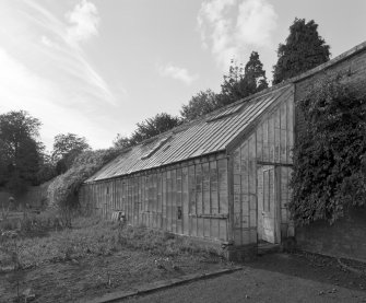 View of greenhouse in walled garden