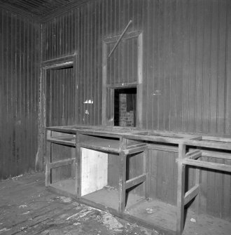 Interior.
Station building, view of ticket staff office from NE showing counter and hatch.