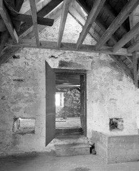 Interior.
View showing door providing access from mill onto kiln floor.