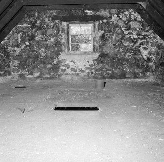 Interior.
View showing kiln floor, which is made up of perforated cast-iron tiles.