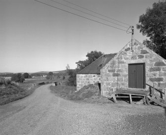 View from S of W corner of mill, showing wing containing kiln on left.