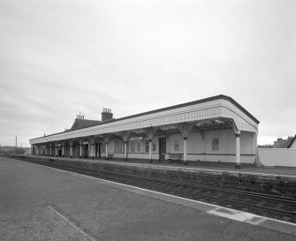 General view from SW of station offices, and south-bound platform and awning