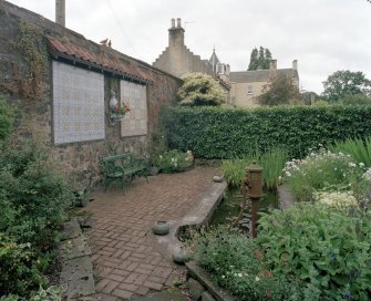 Pond (with Portuguese tilework on adjacent wall), view from NW