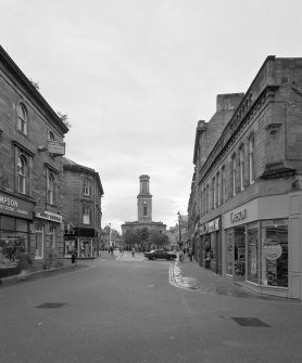 Distant view from E showing top of tower removed.