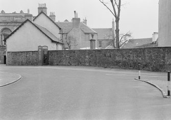 General view of Church Square, Inveraray, showing the garden wall of Bank of Scotland and the top part of the Campbell Monument