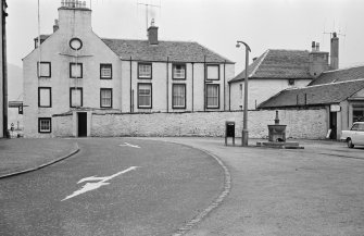 View of of the rear of George Hotel, Inveraray, showing garden wall and kitchen
