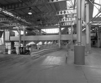 Interior view from south west looking down the ramp leading from the Final Assembly area into the Base Engine Assembly area.