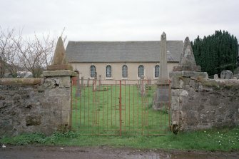 View from SE showing gate pillars.