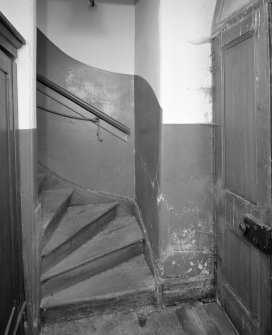 Interior.
View of rear staircase.