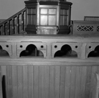 Interior.
Preaching auditorium, detail of panelled rail.