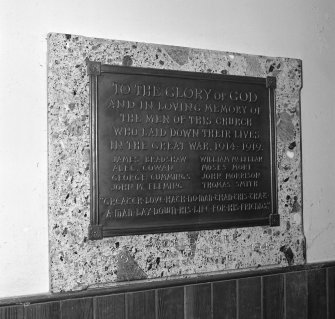 Interior.
Entrance hall, detail of Great War memorial plaque.