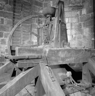 Tower. Third level. Detail of bell and cradle.