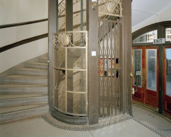 Ground floor, entrance hall, staircase and lift, view from South
