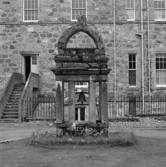 Front entrance, courtyard, bellcote, detail