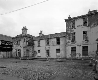 View of courtyard buildings from SW