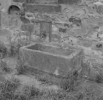 Detail of stone trough situated in front of SE side of steading.