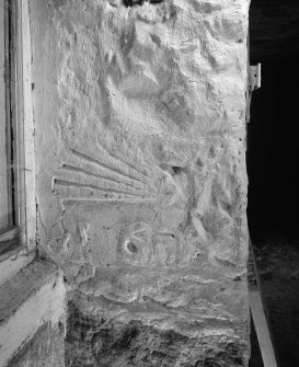 Former stable, detail of carved stone with "16"and a sunburst?