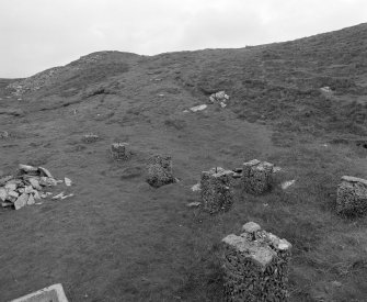 View of remains of crew quarters and gnu emplacement steps from West South West