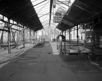 Newtongrange, Lady Victoria Colliery, Pithead Building (Tub Circuit, Tippler Section, Picking Tables)
Pithead area:  view from south of east bays at upper decking level.  This area contained ploughs and conveyors which transferred coal to the picking tables.  The headframe above the shaft can be seen through the exposed steel roof trusses