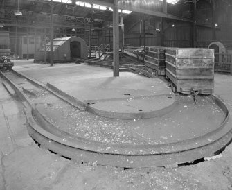 Newtongrange, Lady Victoria Colliery, Pithead Building (Tub Circuit, Tippler Section, Picking Tables)
Pithead upper decking level, Tub Circuit: view from north west of west end of tub circuit, with continuous running turntable in foreground, and tippler (centre background)
