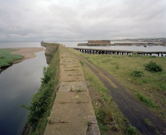 Kirkcaldy Harbour
Elevated view from north, looking along the top of the east pier, showing outer harbour (right) and East Burn (left)
