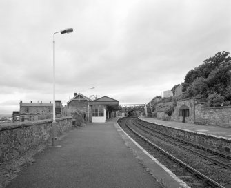 Burntisland, Forth Place, Burntisland Station
General view from E of station, showing main offices and canopy on S platform (left), shelter on N platform (right), and footbridge