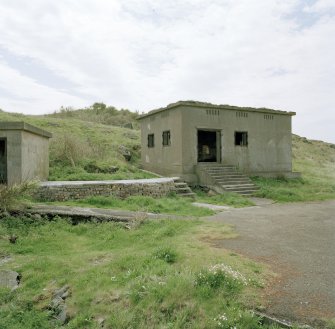 Edinburgh, Cramond Island, Cramond Battery, coast battery. View of gun battery engine house from North East showing entrance with steps, ventilators and steel window shutters..