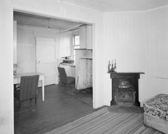 View of dining room / kitchen from South