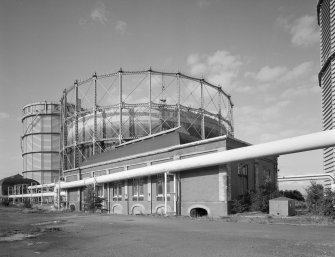 Edinburgh, Granton Gasworks, Pumping Station
General view from SE with gasholder no.2 (left), gasholder no.1 and gasholder no.3 (extreme right). Gasholder no.3 leg is visible in the foreground and the common feed leg is visible on the left
