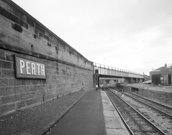 Perth, Leonard Street, General Station
View from south south east of Station sign and bridge carrying access road to Glasgow Road over railway