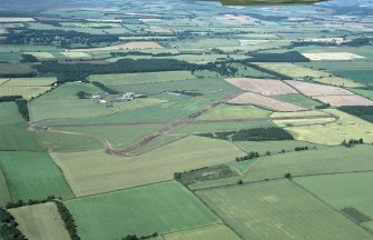 Oblique aerial view centred on Charterhall Airfield, taken from the SE.