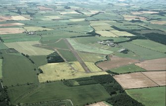 Oblique aerial view centred on Charterhall Airfield, taken from the E.