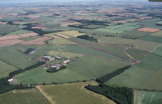 Oblique aerial view centred on Charterhall Airfield, taken from the WNW.