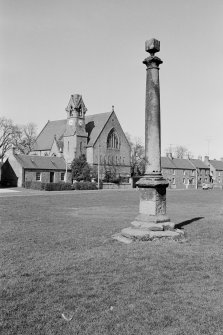 View of the market cross at the Green, Swinton and the Village Hall, former United Free Church
