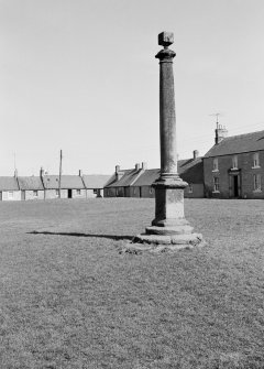 View of the market cross at the Green, Swinton village