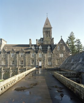 Elevated view along cloister roof from West South West