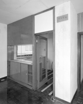 Top floor, caretaker's flat, view of living room cum kitchen