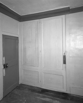 Interior.View of ground floor South room/ parlour showing a detail of the panelling