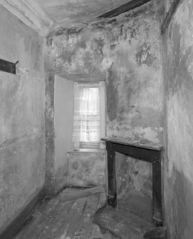 Interior. View of room off ground floor South room/parlour from West showing fireplace